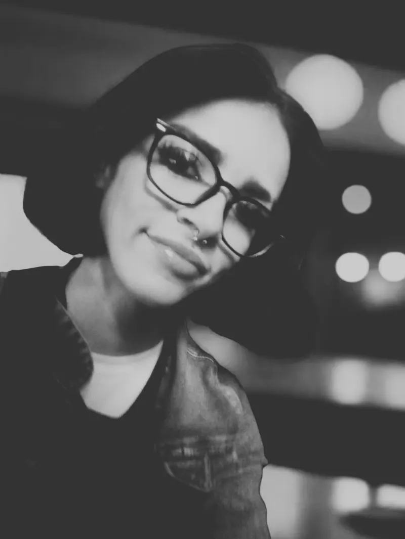 Genesis, black and white portrait with glasses
